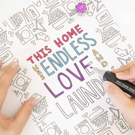 Hand coloring the Love and Laundry Coloring Page