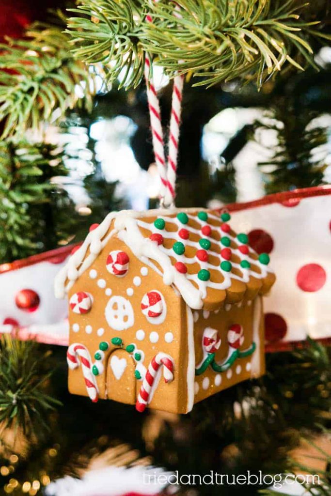 Gingerbread House Homemade Clay Ornament hanging from tree.